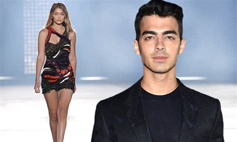 Joe Jonas Supports Girlfriend Gigi Hadid Model For Versace At Milan Fashion Week Daily Mail Online