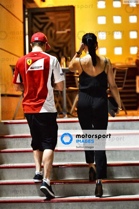 L To R Kimi Raikkonen Fin Ferrari And His Girlfriend Minttu