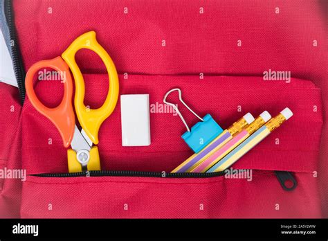 Top View Red Bag Backpack For Education Children On Blue Background