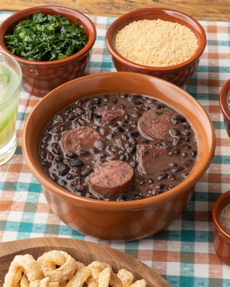 Premium Photo Typical Brazilian Feijoada With Rice Caipirinha Farofa