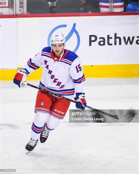 Jake Leschyshyn Of The New York Rangers In Action Against The Calgary