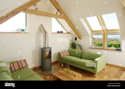 Loft Conversion Sitting Room With Skylight Windows And Woodburning