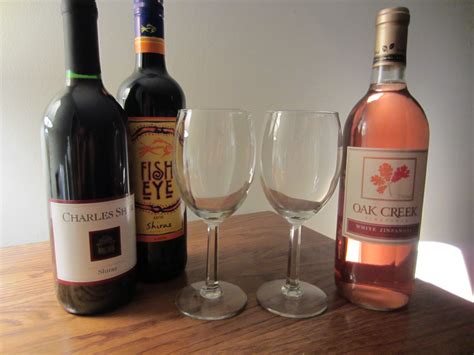 September 18 Bottle Of White Zinfandel Two Bottles Of Chiraz And Two Wine Glasses The Great