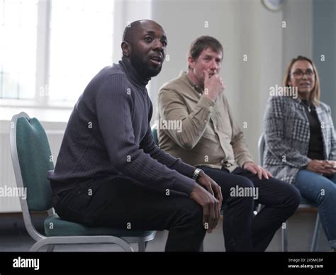 People In Group Therapy Session Stock Photo Alamy