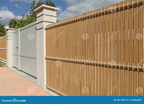 Garden Fencing with Mesh Panels and Pvc Blackout Slats Stock Image ...