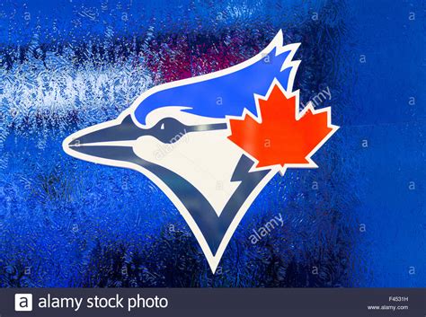 Logo of the Toronto Blue Jays baseball team on a blue frosted glass ...