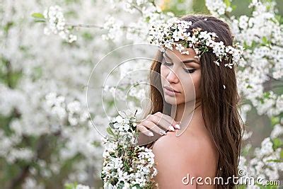 Sensual Nude Woman With Wreath And Cherry Branches Enjoys The Summer