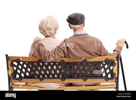 Vieille Dame Assise Sur Un Banc En Bois Banque De Photographies Et D