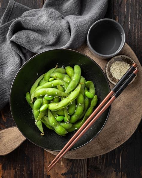 Premium Photo Edamame Beans Soybeans On A Wooden Background Top View