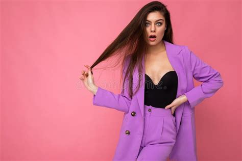 Portrait Of Surprised Amazed Beautiful Fashionable Brunette Woman In Casual Trendy Violet Jacket