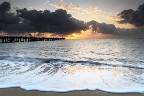 Coastal Tropical Sunrise at Palm Cove Beach Stock Photo - Image of ...