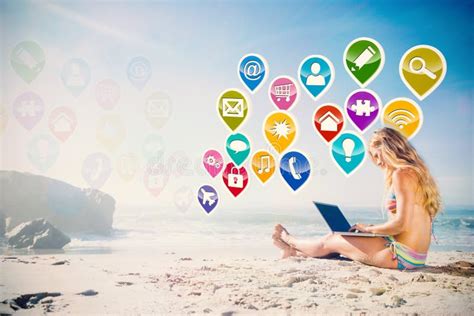 Composite Image Of Gorgeous Blonde In Bikini Using Laptop On The Beach