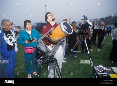 Amateur Astronomers Viewing A Solar Eclipse At Griffith Park