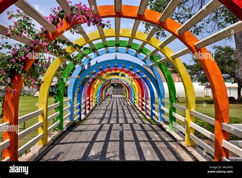 Colors of the rainbow. Multi coloured archway. Rainbow coloured arch ...