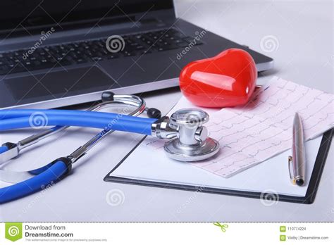 Workplace Of Doctor With Laptop Stethoscope RX Prescription Glasses