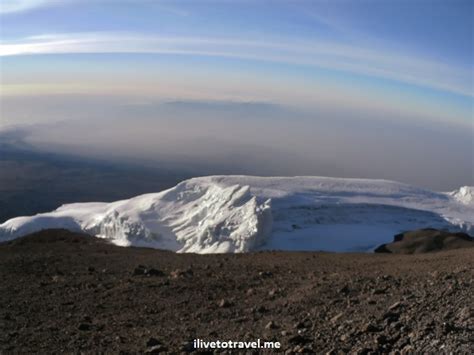 Reaching the summit of Mt. Kilimanjaro on day 6 | ilivetotravel's travel log