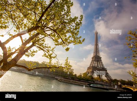 Eiffel Tower with boat on Seine in Paris, France Stock Photo - Alamy