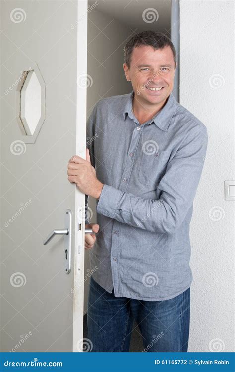 Man Opening The Door Stock Photo Image Of Door Camera 61165772