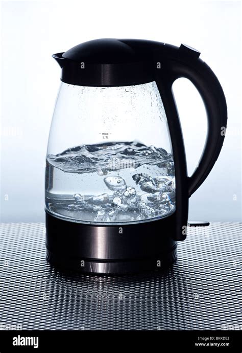 Modern Electric Kettle Boiling Water Using Schott Duran Heatproof Stock