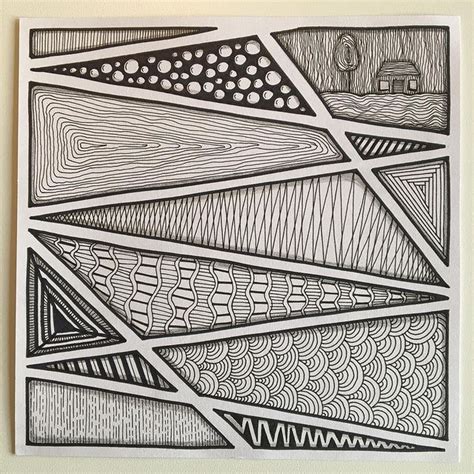 A Black And White Drawing On Paper With Lines In The Shape Of Waves