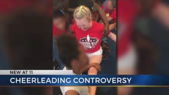 Local Cheerleaders React To Video Showing Girls Forced Into Splits Youtube