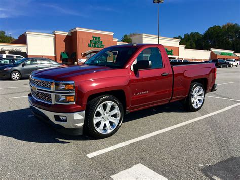 Red Chevy Truck With Black Rims