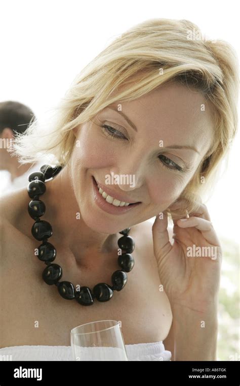 Mature Blond Woman Smiling Stock Photo Alamy