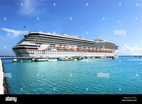 Cruise Ship Anchored At Port In Tropical Waters Stock Photo Alamy