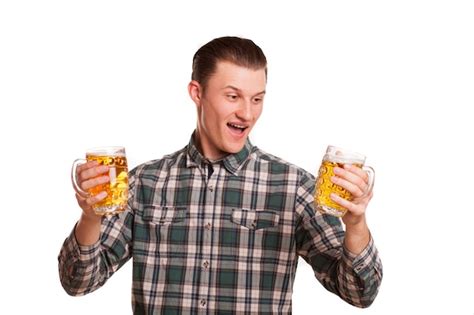 Premium Photo Handsome Man Looking Excited Holding Two Glasses Of