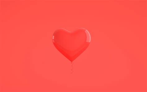 Premium Photo Red Glossy Shiny Balloons Heart Shape On Pastel Pink