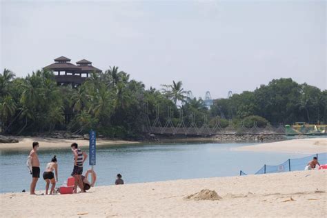 Sparse crowds at Sentosa beaches on first day with online booking ...