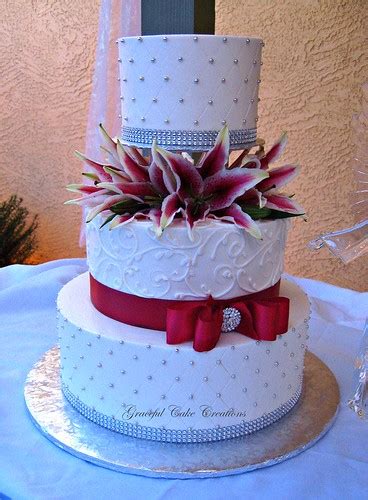 Elegant White Buttercream Wedding Cake With Silver And Red Flickr