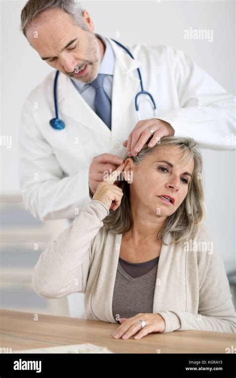 Senior Woman Feeling Neck Pain Stock Photo Alamy