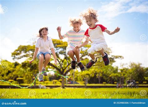 Happy Kids Play Outdoor Children Skipping Rope Stock Photo Image Of