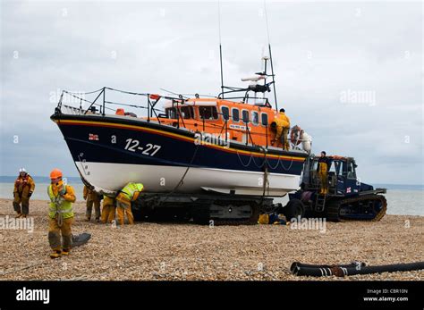 Lifeboat Crew Securing Their Lifeboat To The Trailer Dungeness Kent