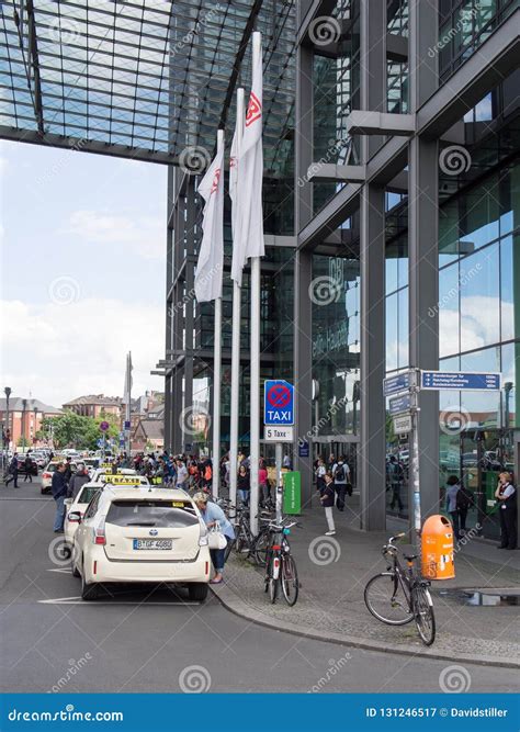 Travelers And Taxis Waiting In Front Of The Railway Station Barcelona