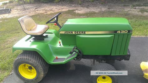 John Deere 430 Diesel Lawn And Garden Tractor W/ 60in Mid - Mount Mower Deck