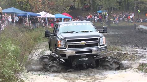 Muddy Jacked Up Chevy Trucks