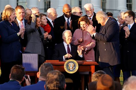 Biden Signs 1 Trillion Infrastructure Bill Into Law Reuters