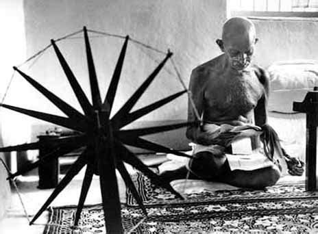 Gandhi at Spinning Wheel - BeMagazine.org