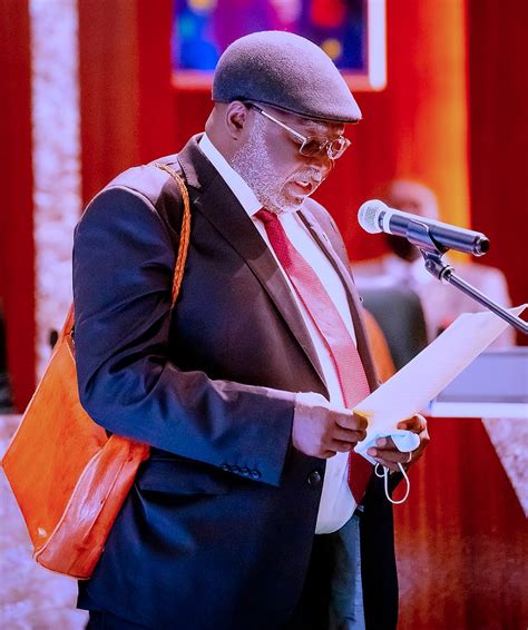 Breaking President Buhari Swears In Justice Ariwoola As Acting Cjn