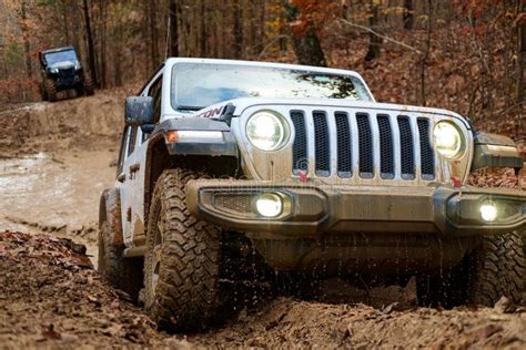 Jeep Rubicon Jk Climbing A Hill On A Muddy Trail Editorial Stock Photo