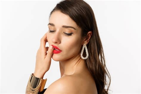 Premium Photo Fashion And Beauty Concept Tender And Feminine Brunette Woman Touching Red Lips
