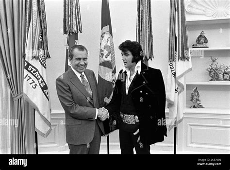 Richard Nixon And Elvis Presley Shaking Hands In The Oval Office On