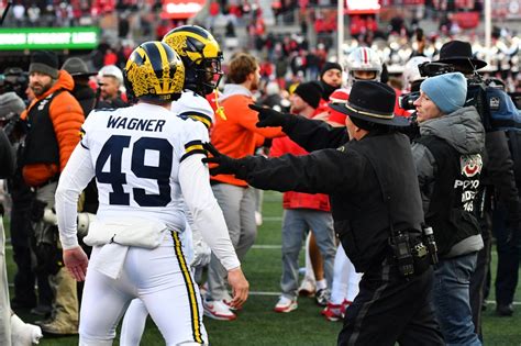 Michigan Upset Over Ohio State Erupts Into Brawl Captured Live On Tv