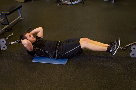 Cable Tuck Reverse Crunch Exercise Guide And Video