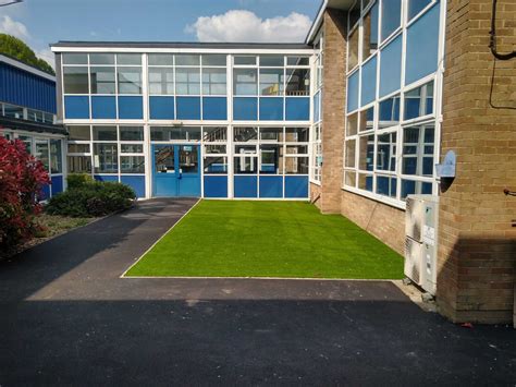 Merstone School, Solihull: Installation of new outdoor play area with TigerTurf’s Deluxe and ...