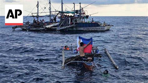 Filipino Activists Decide Not To Sail Closer To Disputed Shoal