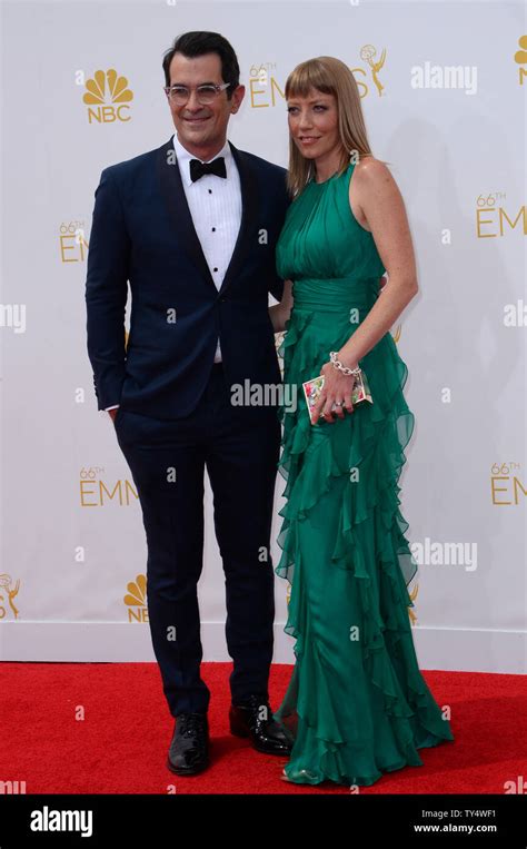 Actor Ty Burrell (L) and Holly Anne Brown arrive at the Primetime Emmy ...