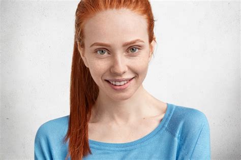 Free Photo Portrait Of Happy Delighted Beautiful Red Haired Adorable